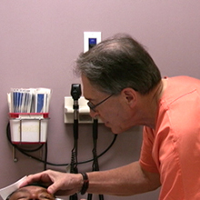 Dr. Felton working on patient
